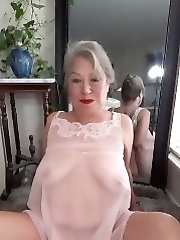 Mature bbw woman in a transparent night gown